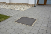 uložená vodoměrná šachta v chodníku